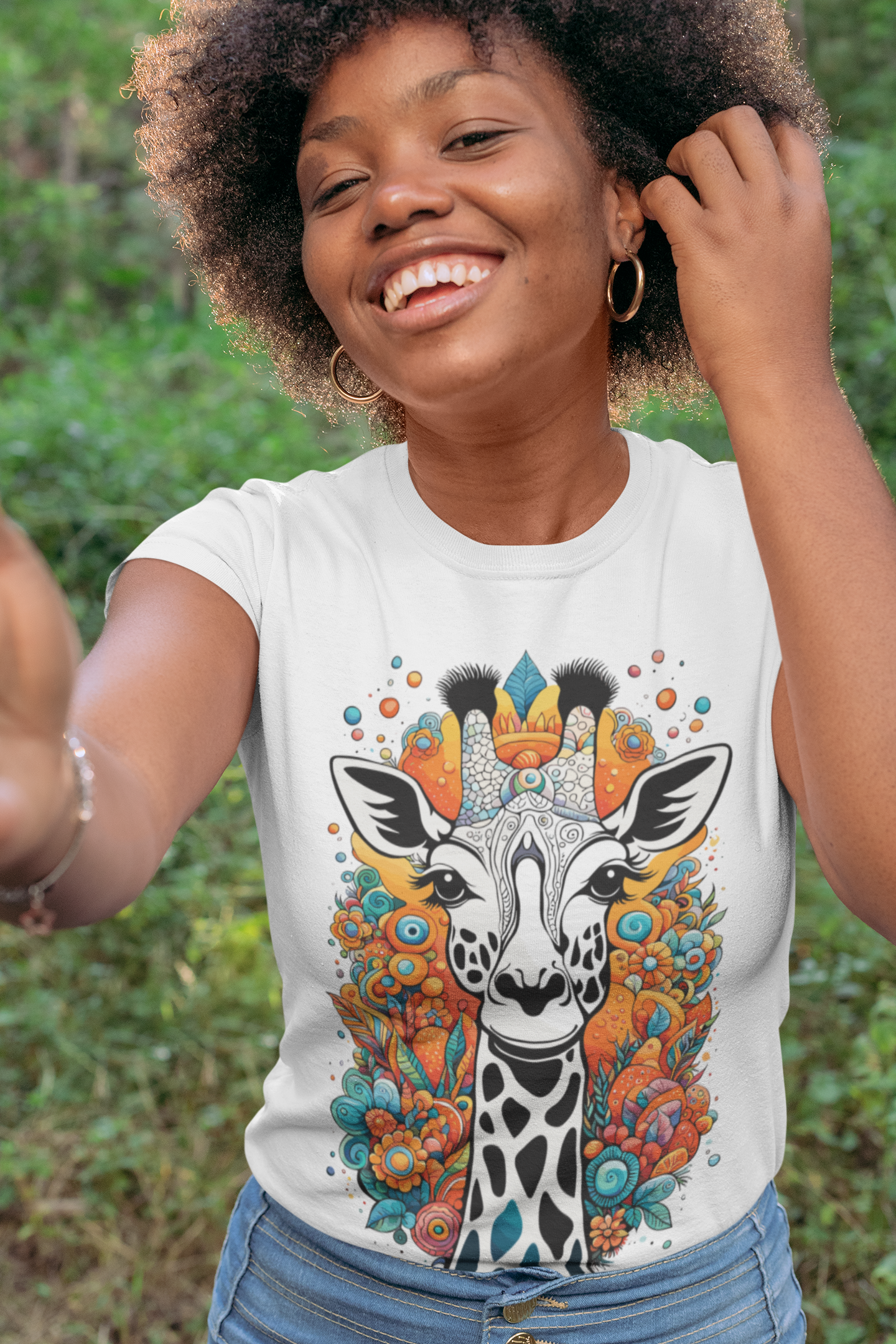 American melananted girl with afro wearing graphic white t-shirt